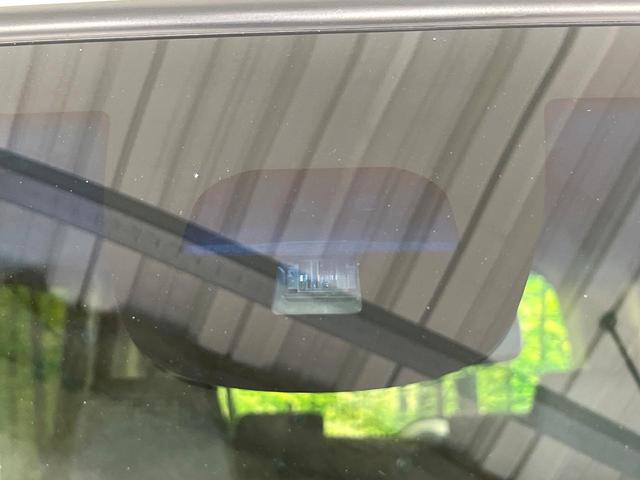 Ｎ－ＢＯＸカスタム Ｇ・Ｌパッケージ　電動スライドドア　純正ＳＤナビ　バックカメラ　衝突被害軽減システム　禁煙車　スマートキー　ＨＩＤヘッド　ビルトインＥＴＣ　オートライト　オートエアコン　純正１４インチアルミ　Ｂｌｕｅｔｏｏｔｈ　ＣＤ（3枚目）