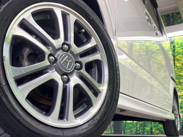 Ｎ－ＢＯＸカスタム Ｇ・Ｌパッケージ　電動スライドドア　純正ＳＤナビ　バックカメラ　衝突被害軽減システム　禁煙車　スマートキー　ＨＩＤヘッド　ビルトインＥＴＣ　オートライト　オートエアコン　純正１４インチアルミ　Ｂｌｕｅｔｏｏｔｈ　ＣＤ（13枚目）