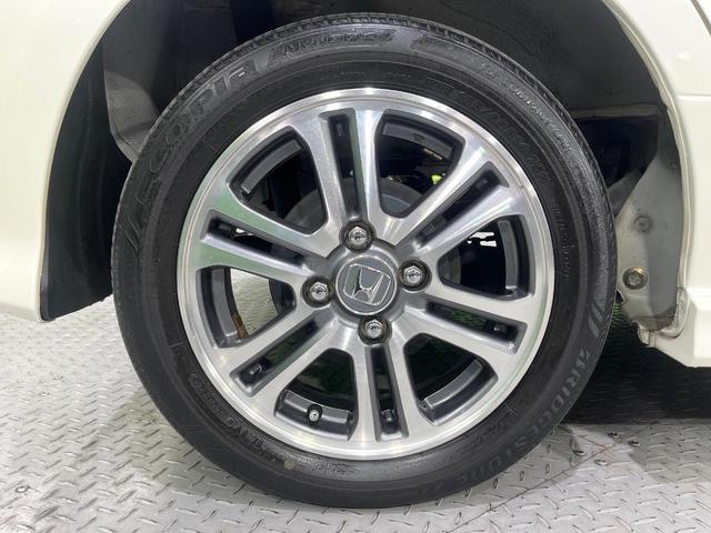 Ｎ－ＢＯＸカスタム Ｇ・Ｌパッケージ　電動スライドドア　純正ＳＤナビ　バックカメラ　衝突被害軽減システム　禁煙車　スマートキー　ＨＩＤヘッド　ビルトインＥＴＣ　オートライト　オートエアコン　純正１４インチアルミ　Ｂｌｕｅｔｏｏｔｈ　ＣＤ（27枚目）