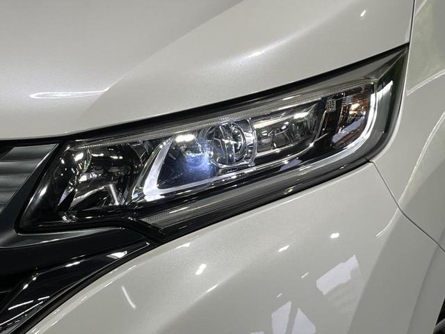 フリード Ｇ・ホンダセンシング　禁煙車　衝突軽減装置　メモリーナビ　Ｂｌｕｅｔｏｏｔｈ再生　バックカメラ　両側電動スライド　レーンアシスト　オートエアコン　ＬＥＤライト　オートライト　スマートキー　電動格納ミラー　ＥＴＣ（12枚目）
