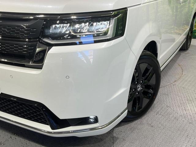 ステップワゴン ｅ：ＨＥＶスパーダ　登録済未使用車　衝突被害軽減システム　両側電動スライドドア　１１．４インチ純正ナビ　レーダークルーズ　電動リアゲート　バックカメラ　ハーフレザーシート　スマートキー　ＬＥＤヘッド　シートヒーター（13枚目）