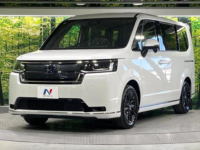 ステップワゴン ｅ：ＨＥＶスパーダ　登録済未使用車　衝突被害軽減システム　両側電動スライドドア　１１．４インチ純正ナビ　レーダークルーズ　電動リアゲート　バックカメラ　ハーフレザーシート　スマートキー　ＬＥＤヘッド　シートヒーター（54枚目）