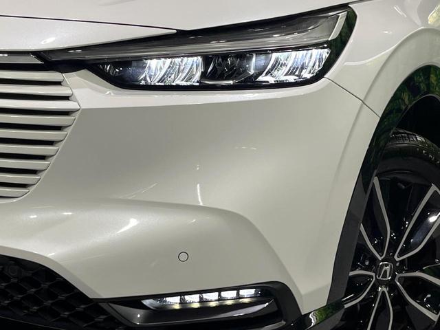 ヴェゼル ｅ：ＨＥＶ　Ｚ　禁煙車　ホンダセンシング　純正９型ナビ　全周囲カメラ　ブラインドスポット　電動リアゲート　シートヒーター　電動パーキングブレーキ　パドルシフト　ＥＴＣ　シーケンシャルターンランプ　コーナーセンサー（12枚目）