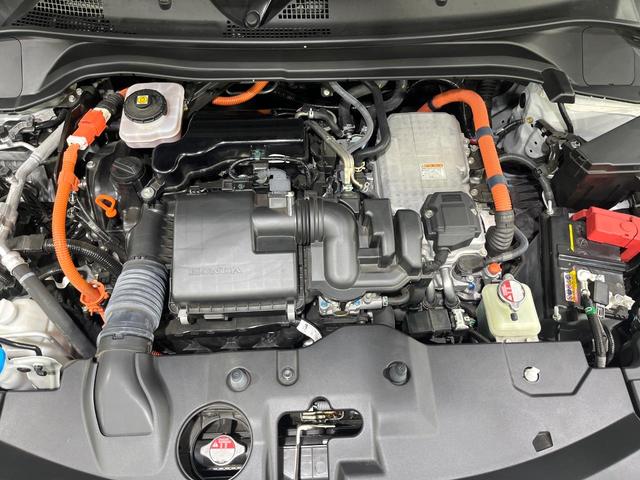 ヴェゼル ｅ：ＨＥＶ　Ｚ　禁煙車　ホンダセンシング　純正９型ナビ　全周囲カメラ　ブラインドスポット　電動リアゲート　シートヒーター　電動パーキングブレーキ　パドルシフト　ＥＴＣ　シーケンシャルターンランプ　コーナーセンサー（18枚目）