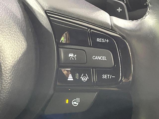 ヴェゼル ｅ：ＨＥＶ　Ｚ　禁煙車　ホンダセンシング　純正９型ナビ　全周囲カメラ　ブラインドスポット　電動リアゲート　シートヒーター　電動パーキングブレーキ　パドルシフト　ＥＴＣ　シーケンシャルターンランプ　コーナーセンサー（25枚目）