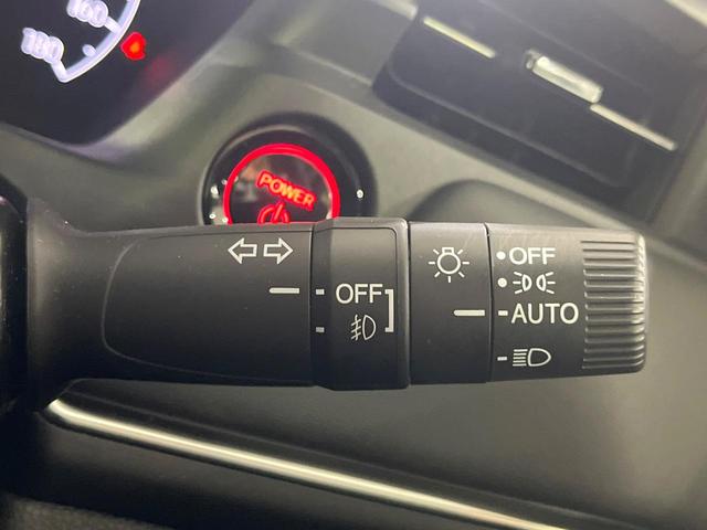 ヴェゼル ｅ：ＨＥＶ　Ｚ　禁煙車　ホンダセンシング　純正９型ナビ　全周囲カメラ　ブラインドスポット　電動リアゲート　シートヒーター　電動パーキングブレーキ　パドルシフト　ＥＴＣ　シーケンシャルターンランプ　コーナーセンサー（27枚目）