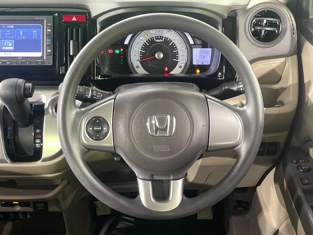 N-WGN G・Lパッケージ 禁煙車 衝突被害軽減システム 純正ナビ バックカメラ スマートキー ETC オートエアコン シートリフター ステアリングスイッチ 電動格納ドアミラー Bluetooth CD(11枚目)