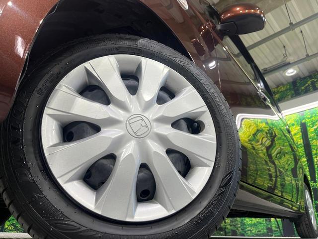 N-WGN G・Lパッケージ 禁煙車 衝突被害軽減システム 純正ナビ バックカメラ スマートキー ETC オートエアコン シートリフター ステアリングスイッチ 電動格納ドアミラー Bluetooth CD(13枚目)