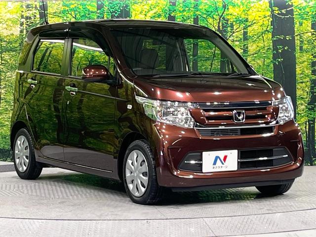 N-WGN G・Lパッケージ 禁煙車 衝突被害軽減システム 純正ナビ バックカメラ スマートキー ETC オートエアコン シートリフター ステアリングスイッチ 電動格納ドアミラー Bluetooth CD(16枚目)