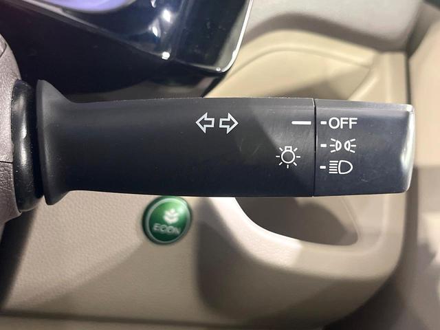 N-WGN G・Lパッケージ 禁煙車 衝突被害軽減システム 純正ナビ バックカメラ スマートキー ETC オートエアコン シートリフター ステアリングスイッチ 電動格納ドアミラー Bluetooth CD(29枚目)