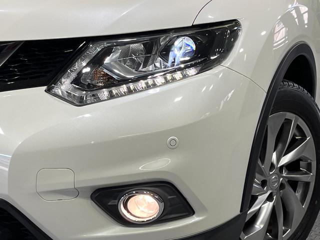 エクストレイル ２０Ｘｔｔ　エマージェンシーブレーキパッケージ　４ＷＤ　７人乗　禁煙車　パノラマルーフ　衝突軽減　純正ナビ　全周囲カメラ　クルコン　電動リアゲート　ＬＥＤライト　オートライト　オートエアコン　ダウンヒルアシスト　横滑り防止装置　純正１８ＡＷ（12枚目）