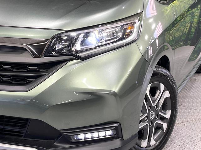 フリード+ クロスター・ホンダセンシング 禁煙車 衝突軽減装置 純正9型ナビ バックカメラ 両側電動スライド 前席シートヒーター ETC 車線逸脱警報 LEDライト オートライト ウィンカーミラー ドラレコ 後席サンシェード(12枚目)