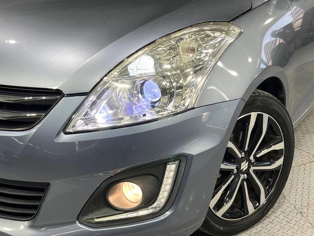 スイフト スタイル－ＤＪＥ　禁煙車　メモリーナビ　バックカメラ　オートエアコン　シートヒーター　パドルシフト　ＥＴＣ　ＨＩＤライト　オートライト　シートリフター　スマートキー　横滑り防止装置　純正１６インチアルミホイール（12枚目）