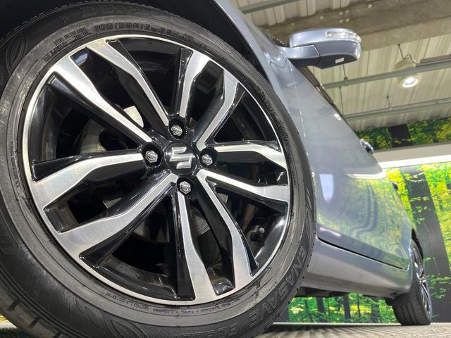 スイフト スタイル－ＤＪＥ　禁煙車　メモリーナビ　バックカメラ　オートエアコン　シートヒーター　パドルシフト　ＥＴＣ　ＨＩＤライト　オートライト　シートリフター　スマートキー　横滑り防止装置　純正１６インチアルミホイール（13枚目）