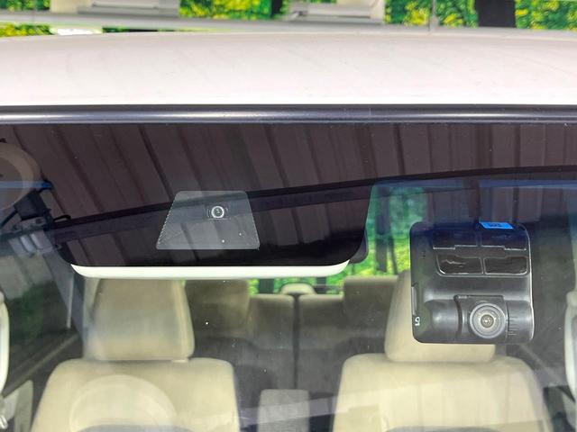 N-BOX G・Lホンダセンシング 禁煙車 ホンダセンシング 純正ナビ バックカメラ 電動スライド オートエアコン レーンアシスト ETC LEDライト オートライト ステアリングスイッチ スマートキー ウィンカーミラー 後席シェード(3枚目)