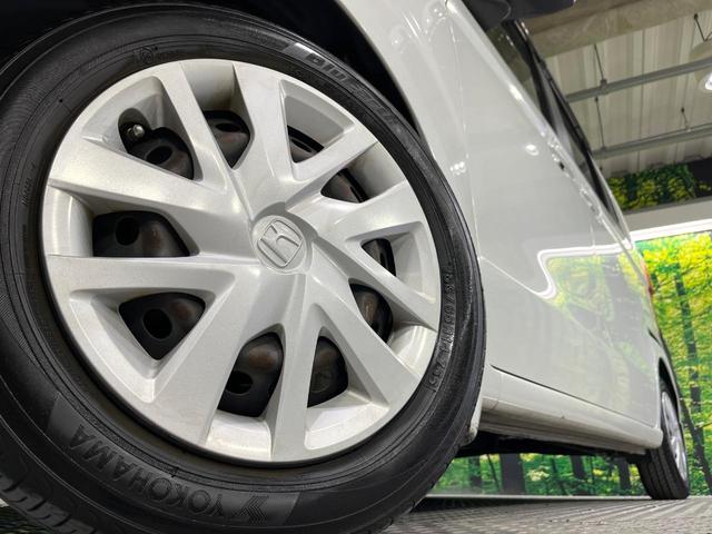 N-BOX G・Lホンダセンシング 禁煙車 ホンダセンシング 純正ナビ バックカメラ 電動スライド オートエアコン レーンアシスト ETC LEDライト オートライト ステアリングスイッチ スマートキー ウィンカーミラー 後席シェード(13枚目)