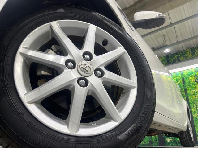 アクア Ｓ　禁煙車　純正ナビ　Ｂｌｕｅｔｏｏｔｈ再生　オートエアコン　ＥＴＣ　キーレスエントリー　純正１５インチアルミホイール　電動格納ミラー　スペアタイヤ　ライトレベライザー（13枚目）