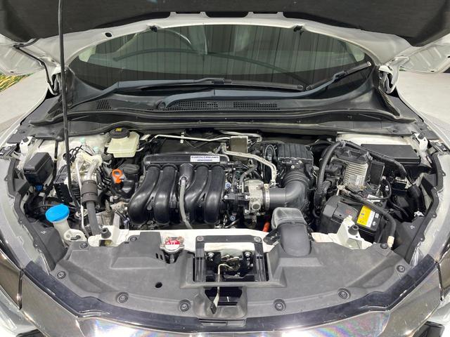 ヴェゼル ハイブリッドＺ・ホンダセンシング　禁煙車　後期型　衝突軽減装置　純正ナビ　バックカメラ　前席シートヒーター　パドルシフト　オートエアコン　ＬＥＤライト　オートライト　ＥＴＣ　レーンアシスト　純正１７インチＡＷ　アダプティブクルーズ（18枚目）