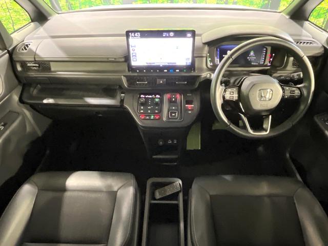 ステップワゴン e:HEVスパーダ 禁煙車 ホンダセンシング 純正11.4型ナビ フリップダウンモニター 全周囲カメラ 両側電動スライド 電動リアゲート シートヒーター パドルシフト ETC リアオートエアコン 2列目オットマン(3枚目)