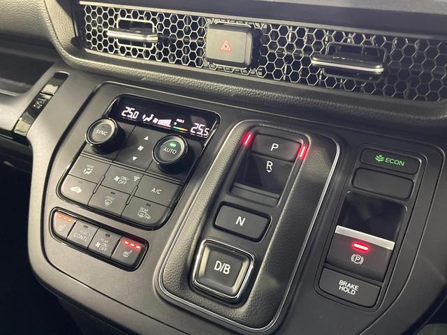 ステップワゴン e:HEVスパーダ 禁煙車 ホンダセンシング 純正11.4型ナビ フリップダウンモニター 全周囲カメラ 両側電動スライド 電動リアゲート シートヒーター パドルシフト ETC リアオートエアコン 2列目オットマン(33枚目)