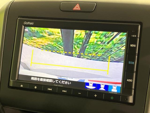 フリードハイブリッド ハイブリッド・Ｇブラックスタイル　禁煙車　衝突軽減装置　純正ナビ　バックカメラ　両側電動スライド　アダプティブクルーズ　シートヒーター　ＬＥＤヘッド　オートライト　オートエアコン　スマートキー　ＥＴＣ　ドラレコ　誤発進抑制機能（5枚目）