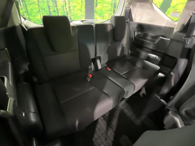 フリードハイブリッド ハイブリッド・Ｇブラックスタイル　禁煙車　衝突軽減装置　純正ナビ　バックカメラ　両側電動スライド　アダプティブクルーズ　シートヒーター　ＬＥＤヘッド　オートライト　オートエアコン　スマートキー　ＥＴＣ　ドラレコ　誤発進抑制機能（10枚目）