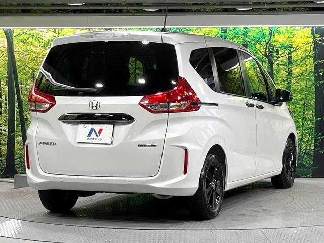 フリードハイブリッド ハイブリッド・Ｇブラックスタイル　禁煙車　衝突軽減装置　純正ナビ　バックカメラ　両側電動スライド　アダプティブクルーズ　シートヒーター　ＬＥＤヘッド　オートライト　オートエアコン　スマートキー　ＥＴＣ　ドラレコ　誤発進抑制機能（18枚目）