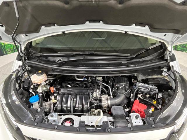 フリードハイブリッド ハイブリッド・Ｇブラックスタイル　禁煙車　衝突軽減装置　純正ナビ　バックカメラ　両側電動スライド　アダプティブクルーズ　シートヒーター　ＬＥＤヘッド　オートライト　オートエアコン　スマートキー　ＥＴＣ　ドラレコ　誤発進抑制機能（19枚目）