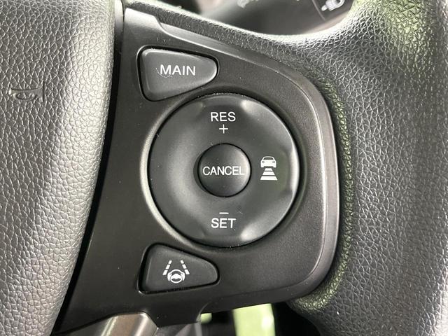 フリードハイブリッド ハイブリッド・Ｇブラックスタイル　禁煙車　衝突軽減装置　純正ナビ　バックカメラ　両側電動スライド　アダプティブクルーズ　シートヒーター　ＬＥＤヘッド　オートライト　オートエアコン　スマートキー　ＥＴＣ　ドラレコ　誤発進抑制機能（22枚目）