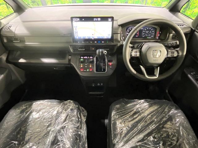 ステップワゴン スパーダ　登録済未使用車　衝突軽減装置　純正１１．４型ナビ　バックカメラ　両側電動スライド　アダプティブクルーズ　ブラインドスポットインフォメーション　シートヒーター　デュアルエアコン　リアオートエアコン（2枚目）