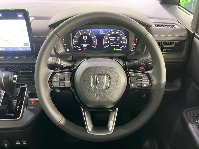 ステップワゴン スパーダ　登録済未使用車　衝突軽減装置　純正１１．４型ナビ　バックカメラ　両側電動スライド　アダプティブクルーズ　ブラインドスポットインフォメーション　シートヒーター　デュアルエアコン　リアオートエアコン（8枚目）