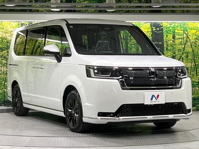 ステップワゴン スパーダ　登録済未使用車　衝突軽減装置　純正１１．４型ナビ　バックカメラ　両側電動スライド　アダプティブクルーズ　ブラインドスポットインフォメーション　シートヒーター　デュアルエアコン　リアオートエアコン（17枚目）