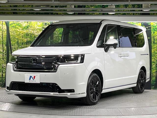 ステップワゴン スパーダ　登録済未使用車　衝突軽減装置　純正１１．４型ナビ　バックカメラ　両側電動スライド　アダプティブクルーズ　ブラインドスポットインフォメーション　シートヒーター　デュアルエアコン　リアオートエアコン（52枚目）