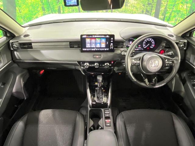 ヴェゼル ｅ：ＨＥＶ　Ｚ　禁煙車　ホンダセンシング　純正９型ナビ　バックカメラ　アダプティブクルーズ　ブラインドスポットインフォメーション　シートヒーター　ハンズフリーパワーバックドア　シーケンシャルターンランプ　ＥＴＣ（2枚目）