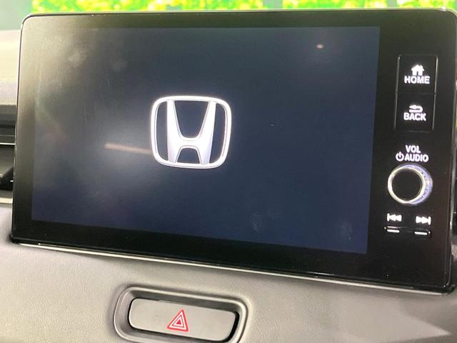 ヴェゼル ｅ：ＨＥＶ　Ｚ　禁煙車　ホンダセンシング　純正９型ナビ　バックカメラ　アダプティブクルーズ　ブラインドスポットインフォメーション　シートヒーター　ハンズフリーパワーバックドア　シーケンシャルターンランプ　ＥＴＣ（4枚目）