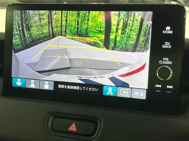 ヴェゼル ｅ：ＨＥＶ　Ｚ　禁煙車　ホンダセンシング　純正９型ナビ　バックカメラ　アダプティブクルーズ　ブラインドスポットインフォメーション　シートヒーター　ハンズフリーパワーバックドア　シーケンシャルターンランプ　ＥＴＣ（5枚目）