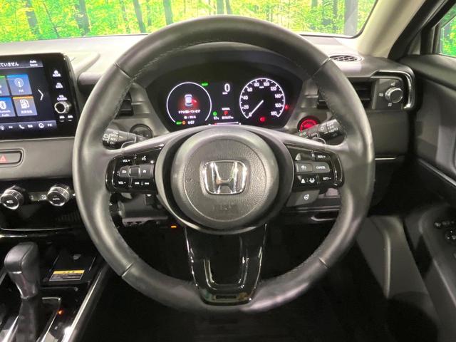 ヴェゼル ｅ：ＨＥＶ　Ｚ　禁煙車　ホンダセンシング　純正９型ナビ　バックカメラ　アダプティブクルーズ　ブラインドスポットインフォメーション　シートヒーター　ハンズフリーパワーバックドア　シーケンシャルターンランプ　ＥＴＣ（8枚目）