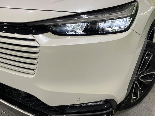 ヴェゼル ｅ：ＨＥＶ　Ｚ　禁煙車　ホンダセンシング　純正９型ナビ　バックカメラ　アダプティブクルーズ　ブラインドスポットインフォメーション　シートヒーター　ハンズフリーパワーバックドア　シーケンシャルターンランプ　ＥＴＣ（12枚目）