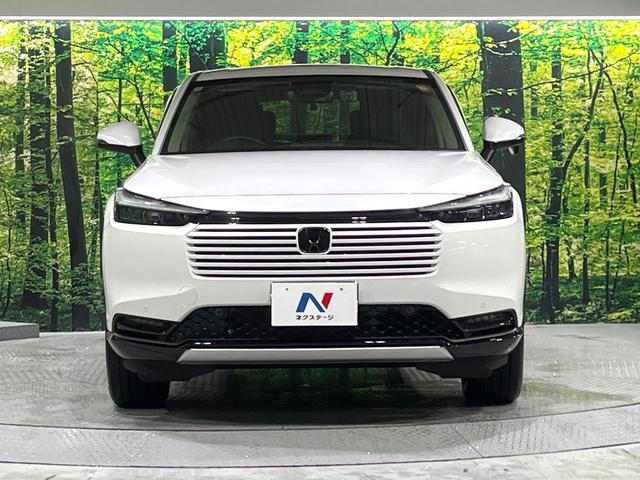 ヴェゼル ｅ：ＨＥＶ　Ｚ　禁煙車　ホンダセンシング　純正９型ナビ　バックカメラ　アダプティブクルーズ　ブラインドスポットインフォメーション　シートヒーター　ハンズフリーパワーバックドア　シーケンシャルターンランプ　ＥＴＣ（14枚目）
