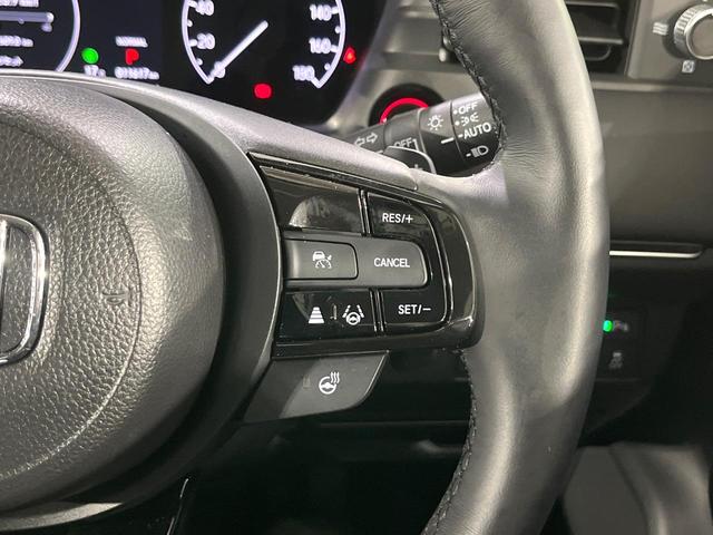 ヴェゼル ｅ：ＨＥＶ　Ｚ　禁煙車　ホンダセンシング　純正９型ナビ　バックカメラ　アダプティブクルーズ　ブラインドスポットインフォメーション　シートヒーター　ハンズフリーパワーバックドア　シーケンシャルターンランプ　ＥＴＣ（21枚目）