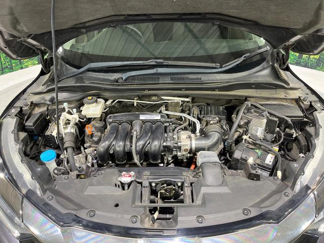 ヴェゼル ハイブリッドＸ・ホンダセンシング　禁煙車　ホンダセンシング　純正８型ナビ　バックカメラ　アダプティブクルーズ　ＬＥＤヘッド　オートライト　デュアルエアコン　スマートキー　電動パーキングブレーキ　パドルシフト　ドラレコ　ＥＴＣ　フルセグ（18枚目）