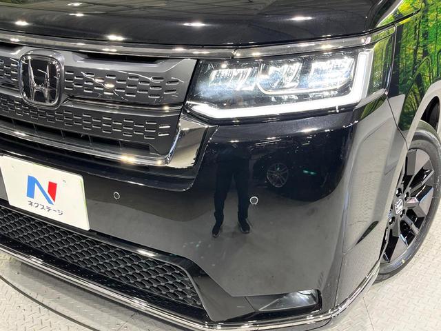 ステップワゴン スパーダ　登録済未使用車　ホンダセンシング　純正１１型ナビ　バックカメラ　両側電動スライド　ブラインドスポットモニター　電動リアゲート　前席シートヒーター　ＬＥＤライト　オートハイビーム　レーンアシスト（12枚目）