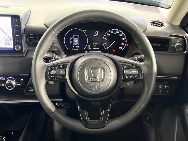 ヴェゼル ｅ：ＨＥＶ　Ｚ　禁煙車　ホンダセンシング　純正９型ナビ　バックカメラ　電動リアゲート　シーケンシャルターンＬＥＤランプ　シートヒーター　ステアリングヒーター　電動パーキングブレーキ　レーンアシスト　パドルシフト（11枚目）