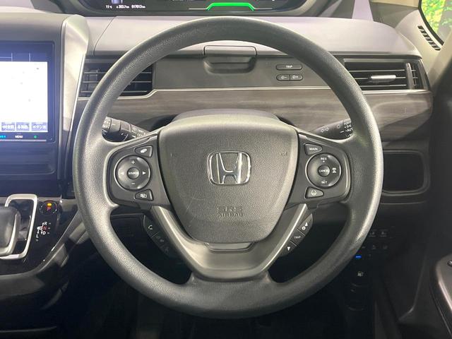 フリード＋ハイブリッド ハイブリッドＧブラックスタイル　禁煙車　ホンダセンシング　純正９型ナビ　バックカメラ　アダプティブクルーズ　両側電動スライド　シートヒーター　ＬＥＤヘッド　オートライト　オートエアコン　スマートキー　ＥＴＣ　ドラレコ（8枚目）