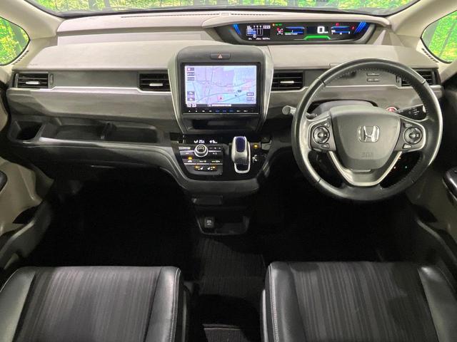 フリードハイブリッド ハイブリッド・ＥＸ　禁煙車　ホンダセンシング　純正９型ナビ　バックカメラ　両側電動スライド　前席シートヒーター　レーンアシスト　アダプティブクルーズ　ＬＥＤライト　オートライト　オートエアコン　純正１５ＡＷ（5枚目）