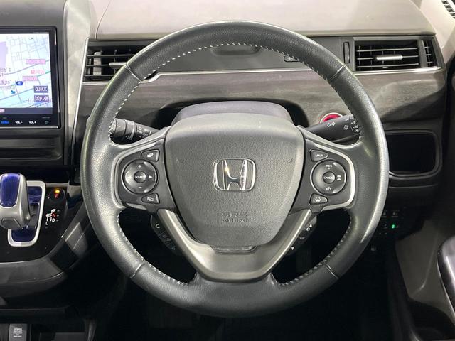 フリードハイブリッド ハイブリッド・ＥＸ　禁煙車　ホンダセンシング　純正９型ナビ　バックカメラ　両側電動スライド　前席シートヒーター　レーンアシスト　アダプティブクルーズ　ＬＥＤライト　オートライト　オートエアコン　純正１５ＡＷ（11枚目）