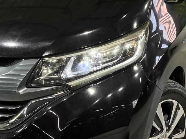 フリードハイブリッド ハイブリッド・ＥＸ　禁煙車　ホンダセンシング　純正９型ナビ　バックカメラ　両側電動スライド　前席シートヒーター　レーンアシスト　アダプティブクルーズ　ＬＥＤライト　オートライト　オートエアコン　純正１５ＡＷ（12枚目）