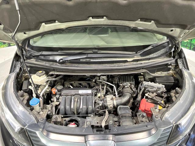 フリードハイブリッド ハイブリッド・ＥＸ　禁煙車　ホンダセンシング　純正９型ナビ　バックカメラ　両側電動スライド　前席シートヒーター　レーンアシスト　アダプティブクルーズ　ＬＥＤライト　オートライト　オートエアコン　純正１５ＡＷ（18枚目）