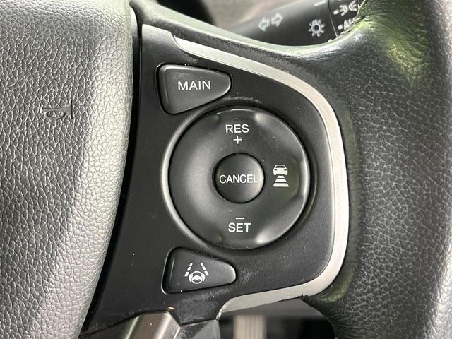 フリードハイブリッド ハイブリッド・ＥＸ　禁煙車　ホンダセンシング　純正９型ナビ　バックカメラ　両側電動スライド　前席シートヒーター　レーンアシスト　アダプティブクルーズ　ＬＥＤライト　オートライト　オートエアコン　純正１５ＡＷ（27枚目）