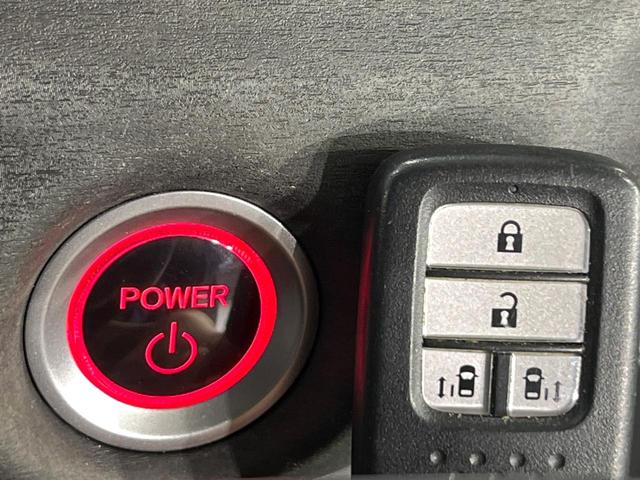 フリードハイブリッド ハイブリッド・ＥＸ　禁煙車　ホンダセンシング　純正９型ナビ　バックカメラ　両側電動スライド　前席シートヒーター　レーンアシスト　アダプティブクルーズ　ＬＥＤライト　オートライト　オートエアコン　純正１５ＡＷ（30枚目）